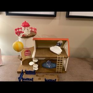 Calico Critters Stary Lighthouse. Retired. Light no longer turns on.
